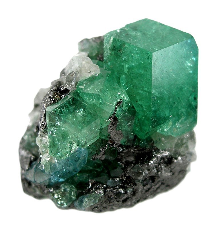 Raw tsavorite crystal specimen sians emporium Raw tsavorite crystal growing on its natural rock matrix with transparent green cubic crystals