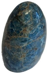 Natural blue apatite polished freeform with flat base 5 sians emporium Polished natural blue apatite standing freeform crystal showing rich teal veining on a flat base