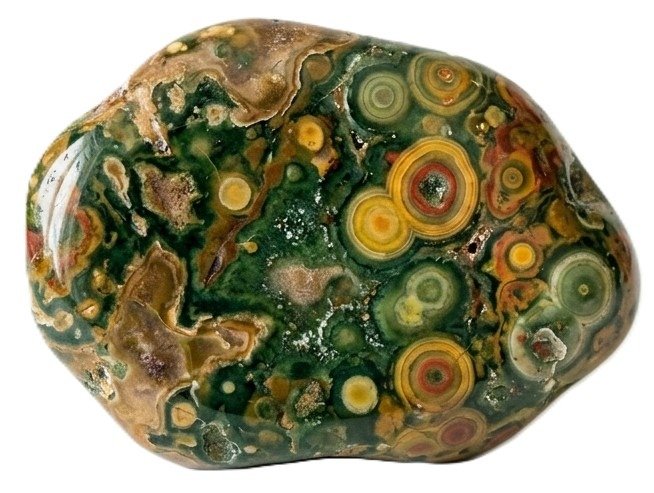 Polished madagascar ocean jasper stone displaying distinct concentric orbicular eyes and circular patterns in shades of green yellow ochre and red